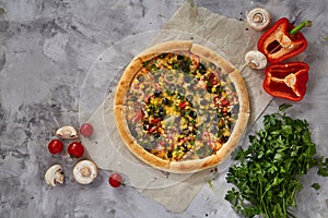 Tasty Italian pizza and its ingredients on white textured background.