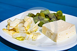 Tasty light Italian healthy meal with fresh asparagus and fennel and cheese, seasoned with olive oil