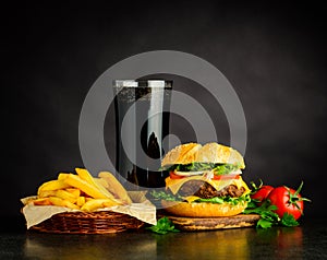 Tasty Looking Cheeseburger with Cola and French Fries
