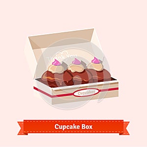 Tasty looking cupcakes in the cardbox