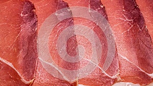 Tasty meat background, thinly sliced jamon