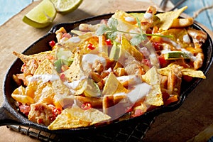 Tasty Mexican chicken au gratin with nachos