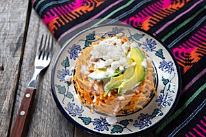 Mexican fideos dry soup with avocado and cheese photo
