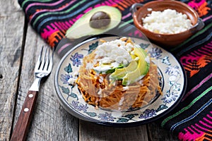 Mexican fideos dry soup with avocado and cheese photo