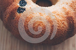 Tasty mouth-watering homemade cake on wooden background