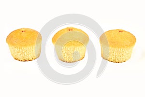 Tasty muffin cakes, isolated on white background.