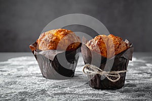 Tasty muffin closeup on dark background