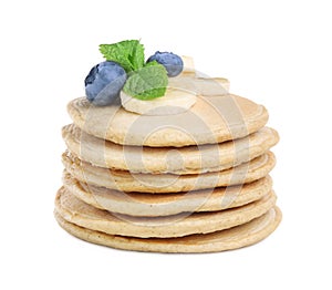 Tasty oatmeal pancakes and ingredients on white background