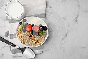 Tasty oatmeal, yogurt and fresh berries served on white marble table, flat lay with space for text. Healthy breakfast