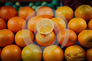 Tasty oranges fruit on display in shop, fresh produce photo