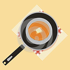 Tasty pancake on frying pan, vector illustration. American breakfast foods.