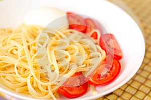 Tasty Pasta spagetti with tomato and cheese.