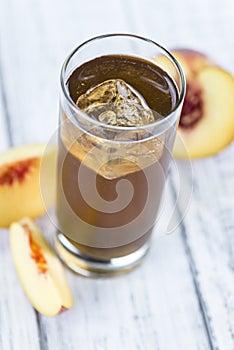 Tasty peach ice tea (selective focus)