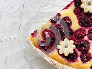 Tasty pie with raspberry and with cute biscuits