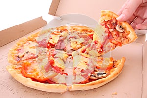 Tasty pizza in box isolated