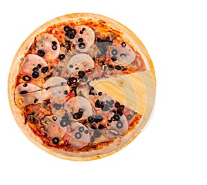 Tasty pizza with ham, mozzarella, mushrooms and olives, without one slice, on wooden platter, isolated on white background