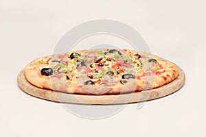 Tasty pizza with vegetables, chicken and olives