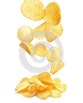 Tasty potato chips falling