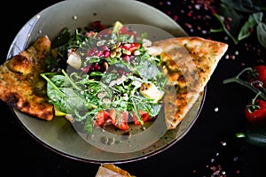Tasty quinoa salad with fresh vegetables & focaccia bread