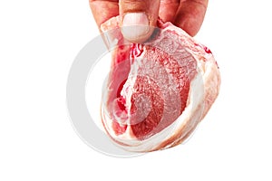 Tasty raw lamb loin chop in a butcher hand. Meat industry. High quality and price product. Food supply industry. Isolated