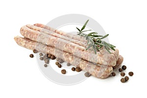 Tasty raw sausages with herb and spices isolated on white background