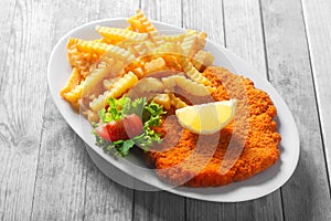 Tasty Recipe of Crumbled Escalope with Fried Fries