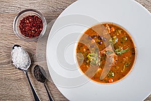 Tasty red goulash soup with tomato