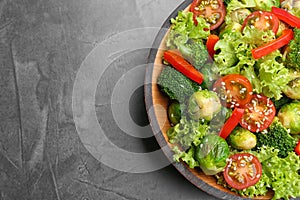 Tasty salad with Brussels sprouts on table, top view. Space for text