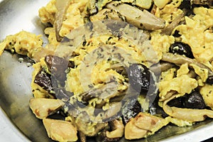 Tasty Scrambled eggs with assorted mushrooms