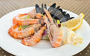 Tasty seafood on plate on table close-up, Siurana, Catalunya, Sp