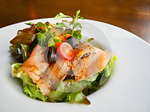 Tasty smoked salmon and fresh greens salad