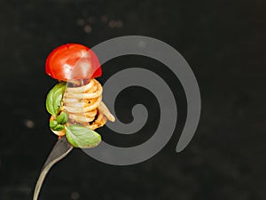Tasty spaghetti wrapped around fork. High quality and resolution beautiful photo concept photo
