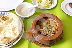 Tasty spicy chicken handi top view