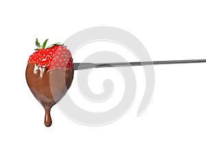 Tasty strawberry dipped into chocolate fondue