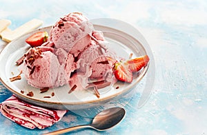Tasty strawberry ice-cream sundae in a parlour photo