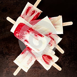 Tasty summer ice lolly with fresh strawberries