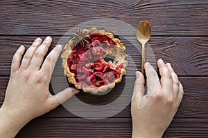 Tasty summer strawberry tart in wooden rustic table