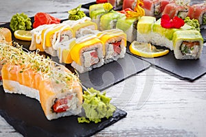 Tasty sushi set. Japanese traditional dishes. Rice rolls. Close up