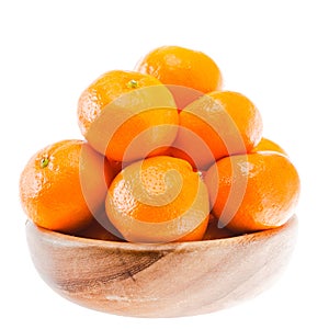 Tasty Sweet Tangerine Orange Mandarin Fruit in wooden bowl