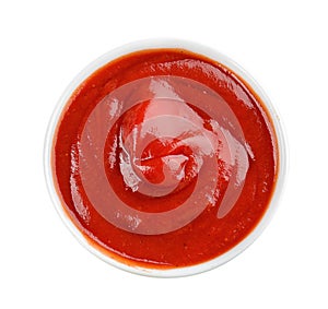 Tasty tomato sauce in bowl on white background