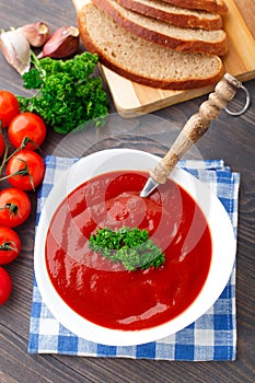 Tasty tomato soup with herbs