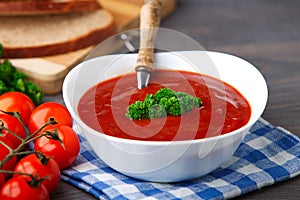 Tasty tomato soup with herbs