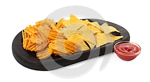 Tasty tortilla and ridged chips with ketchup on white background