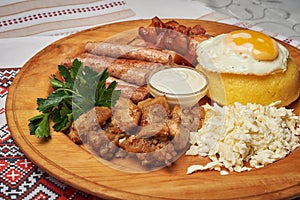 Tasty traditional russian or moldavian or romanian or ukrainian food called mamaliga.Italian traditional Polenta