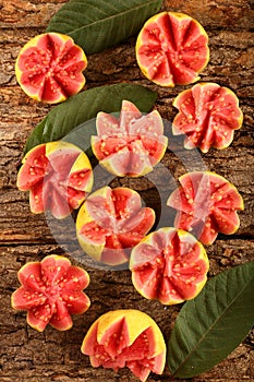 Tasty tropical Indian red guava fruit slices.