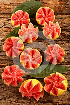 Tasty tropical Indian red guava fruit slices.