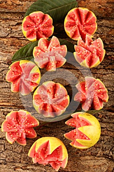 Tasty tropical Indian red guava fruit slices.