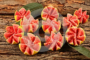 Tasty tropical Indian red guava fruit slices.