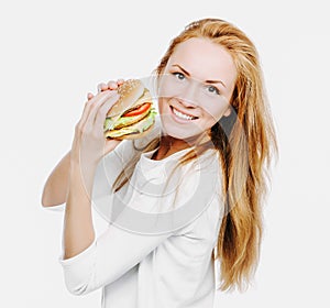 Tasty unhealthy burger sandwich in hands hungry woman getting re