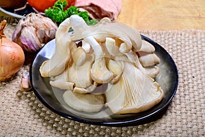 Tasty vegetarian food, fresh organic Pleurotus ostreatus, or oyster mushrooms, hiratake, or pearl oyster mushrooms